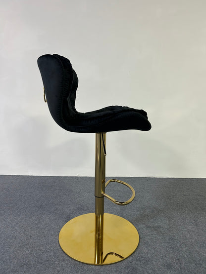 Luxury Golden Barstool in a sleek design with a black cushion and a shiny gold base.
