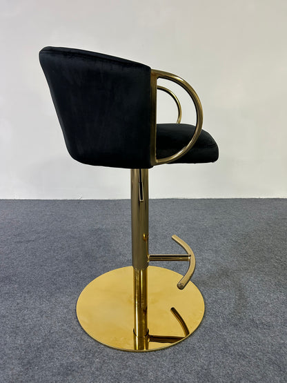 Modern Golden Barstool featuring a sleek black seat and shiny gold base, perfect for contemporary interiors.