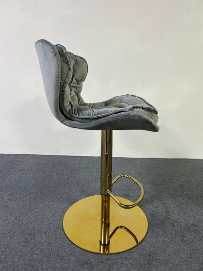 Luxury Golden Barstool featuring a plush gray cushion and a shiny gold base.
